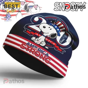 Snoopy America Strong Patriotic Premium Graphic Beanie Hat 1 Navy blue patriotic Snoopy beanie with red and white stripes! Features Snoopy in Uncle Sam hat, Statue of Liberty, text '20 UNITED THE AMERICA 76' and 'AMERICA STRONG'!