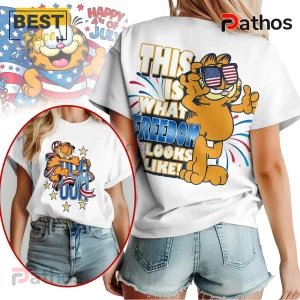 Garfield 4th of July tee! White shirt, cartoon graphic. Text: This is what Freedom looks like!