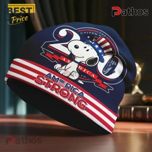 Snoopy America Strong Patriotic Premium Graphic Beanie Hat 2 Navy beanie with patriotic Snoopy-like dog wearing Uncle Sam hat, Statue of Liberty graphic, 20, UNITED THE AMERICA 76, AMERICA STRONG text, red white stripes!