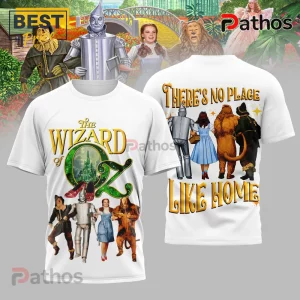 White classic Wizard of Oz t-shirt featuring movie characters. Front: 'THE WIZARD of OZ' with Emerald City, Ruby Slippers. Back: 'THERE'S NO PLACE LIKE HOME' text with characters walking away!