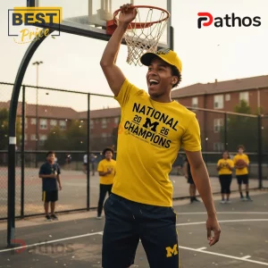 Yellow t-shirt with black text reading NATIONAL 20 M 26 CHAMPIONS and a college M logo!