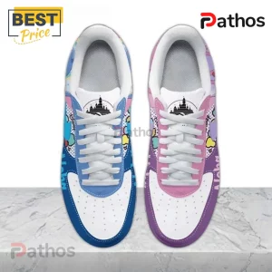 Mismatched sneakers in blue and purple with cartoon alien characters and a fantasy castle logo on the tongue!