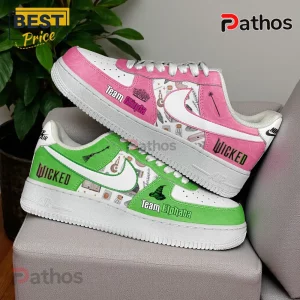 Custom pink and green sneakers with 'Team Glinda' and 'Team Elphaba' text from the musical Wicked!