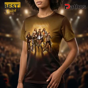 Gold to dark brown gradient tee with a realistic illustration of seven women on a radiating gold stage design!