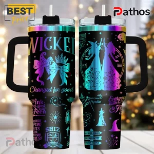 Black tumbler with rainbow gradient Wicked musical design! Text includes 'Wicked', 'Changed for good', 'Popular' with witch silhouettes!