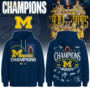 Navy blue Michigan Wolverines hoodie with yellow M, NCAA Men's Basketball Champions 2026 text, trophy graphic, and player signatures!