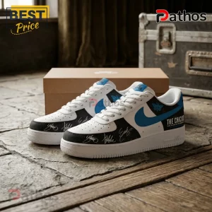 The Chicks Taking The Long Way 20th Anniversary Air Force 1 Sneakers 1 White sneakers with blue swoosh black accents butterfly graphic and The Chicks text on stone floor background!