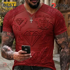 Kappa Alpha Psi 1911 Crimson Diamond Achievement 3D V-Neck T-Shirt 2 Red v-neck t-shirt with embossed Kappa Alpha Psi Greek symbols, diamond graphics, and text reading Achievement 1911!