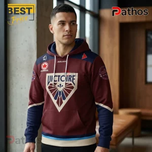 Maroon and navy blue sports hoodie with Victoire text and graphic emblem featuring a leaf logo on the chest!