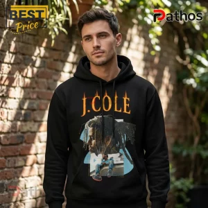 J. Cole The Fall Off Australia Collection Pullover Hoodie 1 Black hoodie with vintage rap style graphic featuring J Cole text in orange flames and portrait illustration!