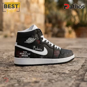 FIFA World Cup 2026 x Madonna Final Halftime Show Air Jordan 1 Sneakers 2 Black and white high top sneakers with FIFA World Cup 2026 and Madonna text graphics on leather side panels!