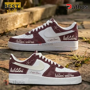 Kehlani World Tour 2026 Burgundy Custom Air Force 1 Sneakers 1 Custom maroon and white sneakers with Kehlani World Tour text and flower graphics on a stone outdoor background!