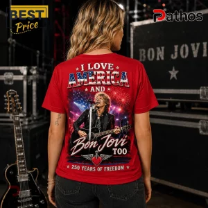 Bon Jovi America 250 Years Of Freedom Patriotic Red Graphic T-Shirt 4 Red t-shirt with Bon Jovi graphic, American flag text, and fireworks design for rock music fans!