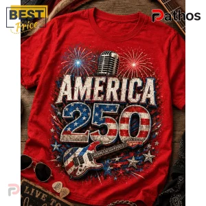 Red t-shirt with America 250 text, vintage microphone, electric guitar, and fireworks graphic in red, white, and blue!