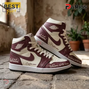Kehlani World Tour 2026 Custom Air Jordan 1 Sneakers 2 Custom high-top sneakers in maroon and cream featuring Kehlani world tour text and signature graphics on leather material!