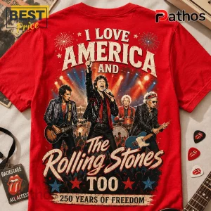 Red graphic t-shirt with Rolling Stones band members, I Love America text, fireworks, and patriotic stars design!