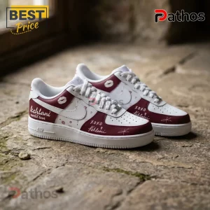 Kehlani World Tour 2026 Limited Edition Air Force 1 Sneakers 2 Custom white sneakers with maroon panels, lip prints, XOXO, and Kehlani world tour text graphics on a stone surface!