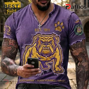 Omega Psi Phi 1911 Que Dog Mascot Distressed Purple Gold T-Shirt 2 Purple distressed V-neck t-shirt featuring yellow bulldog graphic, paw print, and Scholarship Perseverance Uplift text!