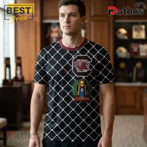 Man wearing black South Carolina Gamecocks jersey with white net pattern, maroon collar, and 3-time NCAA champion logo.!
