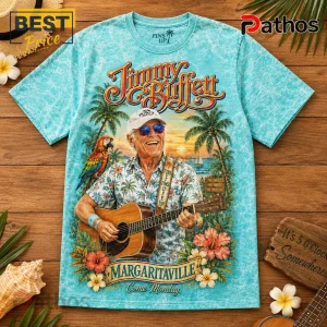 Jimmy Buffett Margaritaville Paradise Song Titles Island T-Shirt 1 Jimmy Buffett t-shirt in light blue with palm trees, a parrot, acoustic guitar, and Margaritaville text on a wooden table.!