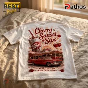 White t-shirt with Dr Pepper Cherry Sunset Sips retro diner graphic featuring a red convertible and cherry illustrations.!
