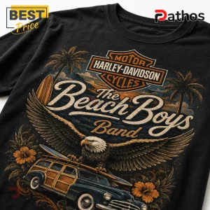 Black cotton t-shirt featuring a vintage Harley-Davidson logo, a surfing eagle, a woody wagon, and The Beach Boys text.!
