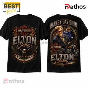 Black cotton t-shirt featuring Elton John, Harley-Davidson logo, eagle, and piano keys in metallic orange and grey print.!
