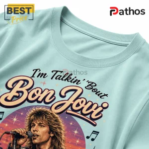 Bon Jovi Retro Roadside Nights Road Trip Vibes T-Shirt 4 Light blue crew neck t-shirt featuring a Jon Bon Jovi graphic with text I'm Talkin' Bout Bon Jovi and musical note icons.!