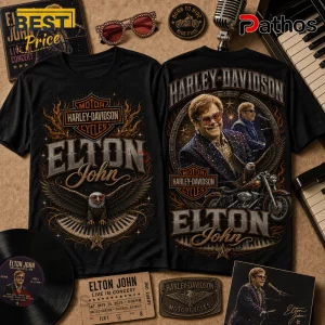 Black cotton t-shirts featuring Elton John graphics, Harley-Davidson logos, eagle imagery, and piano keys on a tan surface.!
