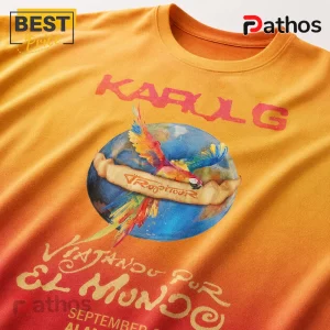 Karol G Tropitour Viajando Por El Mundo Tour Graphic T-Shirt 6 Karol G Tropitour t-shirt in ombre orange and red featuring a parrot on a globe graphic with vintage typography.!