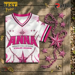 White V-neck sports jersey featuring pink Anna Million Dollar Babe Tour 2026 text with star and chain graphics.!
