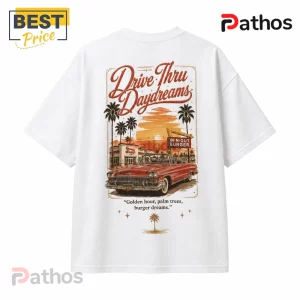 White graphic t-shirt featuring a retro red convertible, palm trees, and In-N-Out Burger signage at sunset.!