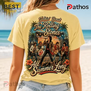 Yellow t-shirt back graphic featuring The Rolling Stones performing on a beach stage with palm trees and floral borders.!