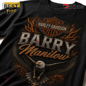 Black cotton t-shirt featuring a Harley-Davidson logo, orange flames, and Barry Manilow text with a bald eagle graphic.!