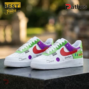 Buzz Lightyear x Taylor Swift Toy Story 5 Air Force 1 Sneakers 1 Custom Buzz Lightyear themed sneakers with white leather, green, purple, and red accents, featuring Toy Story 5 branding.!