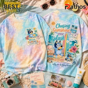 Bluey tie-dye t-shirt featuring Hello Summer graphics, hibiscus flowers, and surfboards on a beach-themed background.!