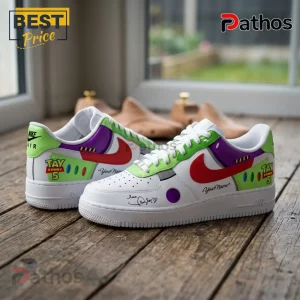 Buzz Lightyear x Taylor Swift Toy Story 5 Air Force 1 Sneakers 3 Custom Buzz Lightyear themed white sneakers featuring red swooshes, green and purple accents, and Toy Story 5 text.!