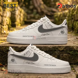 Ellie Goulding I Know Too Much Air Force 1 Sneakers 2 Custom white low-top sneakers with grey swooshes, Ellie Goulding branding, and I KNOW TOO MUCH text on a stone background.!