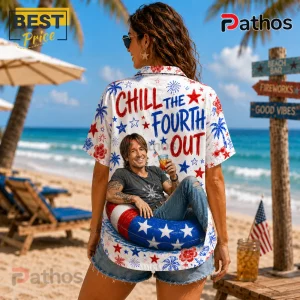 Woman wearing white shirt printed with Chill The Fourth Out text, fireworks, and a man on an American flag pool float.!