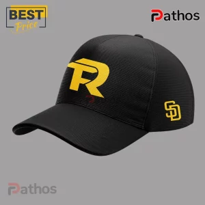Fuerza Regida x San Diego Padres 2026 This Is Our Dream Black Baseball Jersey 4 Black baseball cap featuring a large yellow TR logo on the front and a smaller yellow SD monogram on the side.!