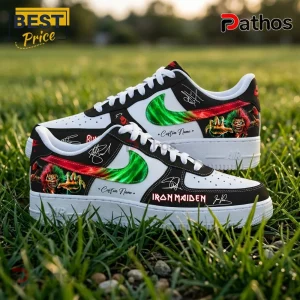 Custom Iron Maiden sneakers with Eddie graphics, green and red gradient swooshes, and white soles on green grass.!