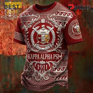 Kappa Alpha Psi fraternity t-shirt in red with white Greek motifs, central crest, and 1911 text against rust background.!