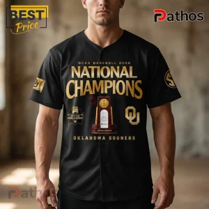 Black Oklahoma Sooners 2026 NCAA National Champions baseball jersey with gold lettering and trophy graphic on chest.!