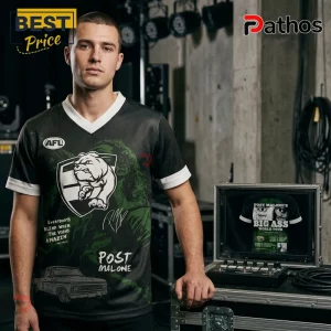 Man wearing a black and green Post Malone graphic v-neck jersey featuring a bulldog, truck, and tour text.!