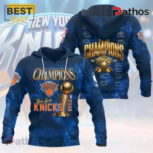 New York Knicks 2026 Champions blue hoodie with gold trophy graphic, team logo, and player signatures on the back.!