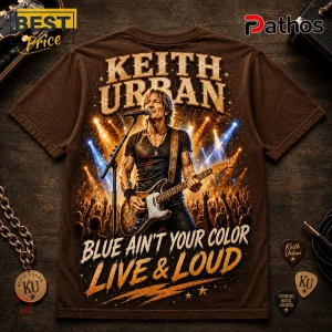 Keith Urban brown graphic t-shirt featuring a concert stage print with text reading Blue Ain't Your Color Live & Loud.!