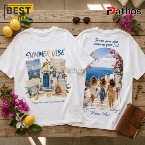 White graphic t-shirt showing front with Summer Vibe text and back featuring women walking toward the ocean in Greece.!