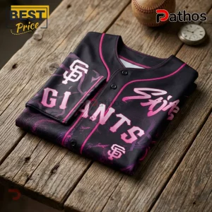 San Francisco Giants baseball jersey in black with pink accents, lettering, and marbled fabric patterns on wooden table.!