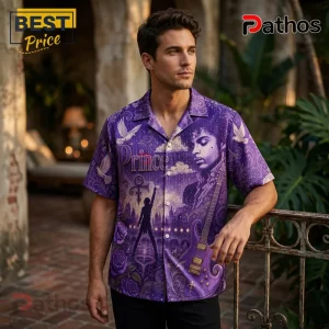 Man wearing a purple button-down shirt with Prince graphic print, featuring white doves, roses, and a guitar silhouette.!