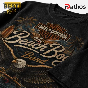 Black cotton t-shirt featuring a vintage Harley-Davidson logo, eagle, surfboards, palm trees, and The Beach Boys text.!
